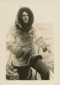 Image of John Halford aboard - wearing sealskin jacket. Bowdoin graduate